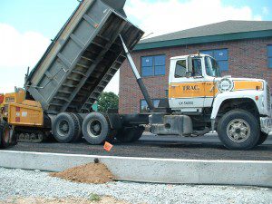 Image of truck dumping gravel